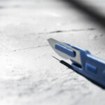 metallic medical scalpel with blade